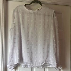 White shirt with white polca dots